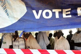Men registered to vote line up at a polling station in Rumbek on January 10, 2011 on the second day of a landmark independence referendum (Getty)