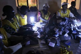 Poll workers begin the process of counting votes after the close of the polls following a week of voting in the independence on January 15, 2011 in the town of Yambio (Getty)