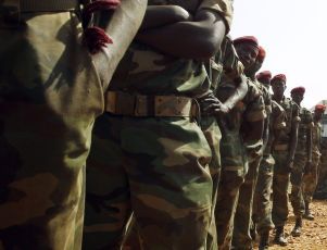 SPLA soldiers wait in line to vote during the referendum, at a polling station in SPLA headquarters in Juba, south Sudan January 10, 2011.  (Reuters)