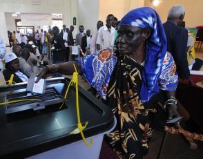 A South Sudanese woman living in Kenya, casts her ballot a polling station in Nairobi on January 9, 2011 (Getty Images)