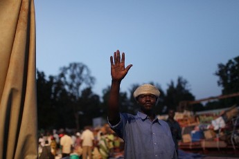 Fearing violence in the north of the country following Sunday`s referendum vote, a man pauses while diembarking a barge that recently returned from the north with hundreds of others January 8, 2011 in Juba, Sudan (AFP)