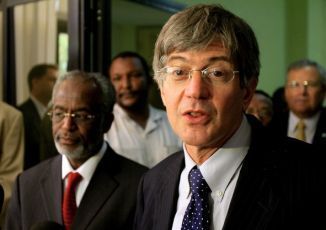 US Deputy Secretary of State James Steinberg (R) speaks to journalists near Sudanese Foreign Minister Ali Ahmed Karti (L) in Khartoum on February 2, 2011 (Getty)