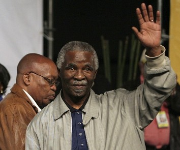 Former South Africa's president Thabo Mbeki standing in front of current president Jacob Zuma (Reuters)