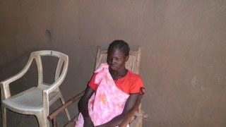 Nyancher Kuol Duom, who lost her daughter and mother-in-law in the attack