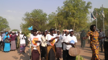 A women's group running across the field in celebration in front of the Jonglei governor's office in Bor on Tuesday. Feb 8, 2011 (ST)