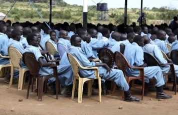 Police trainees listen to a lecture during a visit of the UN Security Council at a UN-run training camp in the southern Sudanese town of Rejaf October 7, 2010. (Reuters)