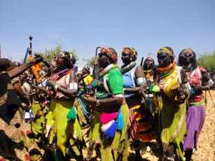 Traditional dancers entertain the crowd at the inaugural ceremony of the Kapoeta power project on. Feb 4, 2011 (ST)