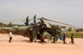 A Russian-supplied Mi-24 attack helicopter with registration number 928 redeployed to El Geneina airport from Nyala, Darfur (photo Amnesty)