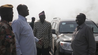 Governor Kuol (left), standing with law enforcement minister, Gabriel Duop Lam (middle) and minister of physical infrastructure, Manawe Peter Gatkuoth (right) near his office (ST)