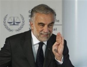 International Criminal Court Prosecutor Louis Moreno-Ocampo gestures as he presents an overview of the alleged crimes committed in Libya since Feb. 15 2011 during a press conference at the ICC in The Hague, Netherlands, Thursday, March 3, 2011. (AP photos)