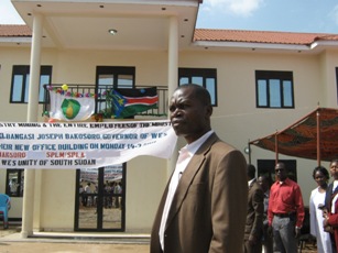 W. Equatoria state governor Bangasi Joseph Bakosoro in front of his state's new finance ministry. March 14, 2011 (ST)