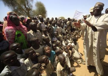 Ibrahim Gambari (R) visits Fanga Suk village, in East Jebel Marra (West Darfur), 88 km from Tawilla March 18, 2011. (Rueters)