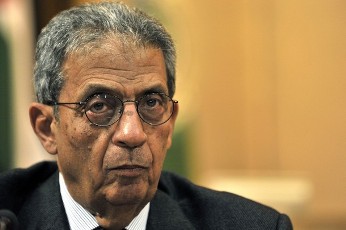 Arab League Secretary General Amr Mussa looks on before the opening of a extraordinary Arab League meeting to discuss a response to the crisis in Libya, including the possible imposition of a no-fly zone, on March 12, 2011 in Cairo (AFP)