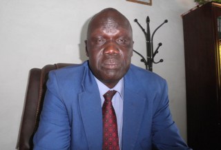 Jonglei state finance minister Aquila Maluth Mam at his office in Bor. March 7, 2011 (ST)