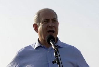 Israeli Prime Minister Benjamin Netanyahu speaks during a visit to the area where Israel has deployed the Iron Dome short-range defence system near the southern city of Ashkelon on April 10, 2011 (GETTY IMAGES)