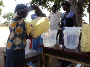 A community member participating in the safe drinking water campaign initiated by Plan South Sudan, March 17, 2011 (Photo: Christine Poni)
