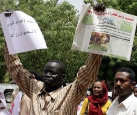 A man protests against the storming by security forces of two newspaper offices in Khartoum in May 2010 (AFP)
