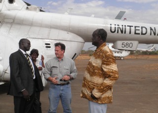 Jonglei governor Kuol Manyang Juuk (right) at Bor Airport with Pigi Comissioner, Aleu Majak (Left) talking to two UN representatives. March 20, 2011, (ST