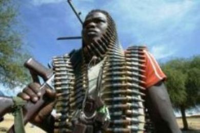 A Sudanese rebel stands guard during the visit of U.N. envoy to Darfur Jan Eliasson to the town of Korma in northwest El Fashir December 9, 2007. (Reuters)