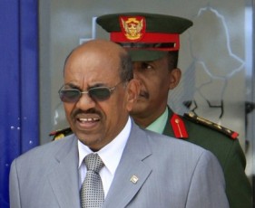Sudan's President Omer Hassan al-Bashir is seen as Chad's President Idriss Deby (not pictured) arrives for an official visit, at Khartoum Airport May 23, 2011 (Reuters)