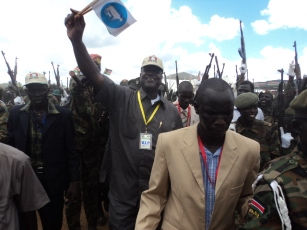 Jonglei state governor Kuol waving Jonglei state flag joins SPLA in a dance in Bor. May 27, 2011 (ST)