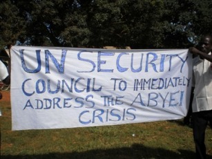 Protestors in Yambio town of Western Equatoria state in South Sudan, hold a banner asking for the UN Security Council to address the crisis over the status of the disputed territory of Abyei. May 23, 2011 (ST)