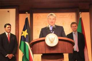 Andrew Mitchell makes his remarks as Rajiv Shah (L) and Solheim (R) look on during the press briefing in Juba, May 7, 2011 (Photo: Safi matata).