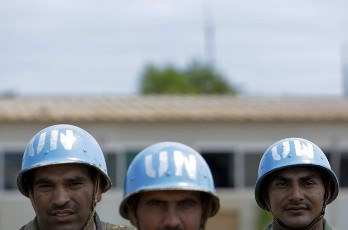 Indian soldiers serving as part of the Force Reserve Battalion with the United Nations Mission in Sudan (UNMIS) stand together as they prepare to depart on a patrol in Abyei town May 25, 2011 (Reuters)