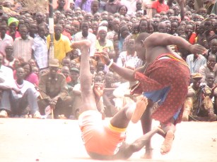 Wrestler from Korim team struggles with member of Murmur team, Bor, South Sudan, May 28, 2011 (ST)