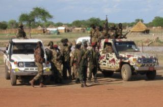 SPLA soldiers gather outside a U.N. base in Abyei May 16, 2008. (Photo: Reuters)