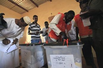 Polling staff and local observers seal ballot boxes on the last day of voting in South Kordofan State May 4, 2011 (Reuters Pictures)