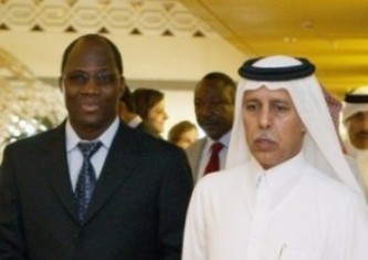 from the left Djibril Bassole and Ahmed Al-Mahmoud in Doha (file photo)