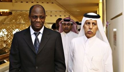 JCM, Djibril Bassolé and Qatari state FM, Ahmed bin Abdullah Al-Mahmoud (file photo /Reuters)