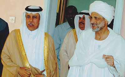 Qatari state minister for foreign affairs Ahmed bin Abdullah Al-Mahmoud (R) with Sudanese presidential adviser Ghazi Salah Al-Deen (file/AFP)the