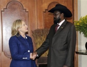 U.S. Secretary of State Hillary Rodham Clinton shares a laugh with Sudanese first Vice President of Southern Sudan Salva Kiir in Addis Ababa, Ethiopia, Monday, June 13, 2011 (AP)