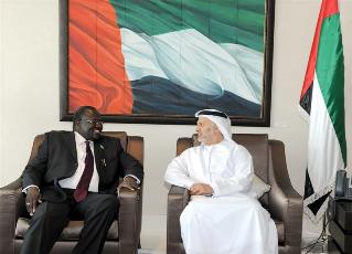 South Sudan Vice President Riek Machar (R) and UAE state Minister for Foreign Affairs Anwar Mohammed Gargash (WAM)