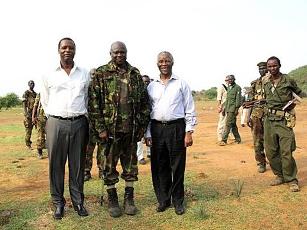 A picture released by Thabo Mbeki's spokesman shows former President of Burundi Pierre Buyoya and AU mediator for the Sudan crisis Thabo Mbeki with Sudan People's Liberation Army (SPLA) commander, Abdel Aziz al-Hilu (C), at his military headquarters in South Kordofan State, Sudan, June 16, 2011 (VOA)