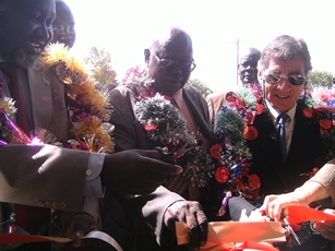 US ambassador, GoSS representative and Lakes state Governor, right to left, open traditional authority building in Rumbek, Lakes state, South Sudan (ST)