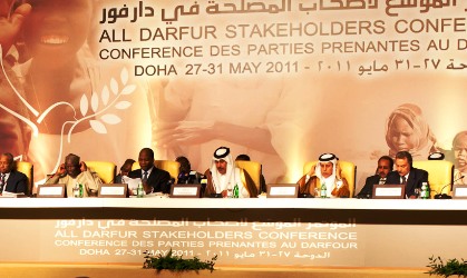 From the left UNAMID head Ibrahim Gambari, JCM Djibril Bassolé, Qatari Prime Minister Hamad bin Jassim bin Jabor al-Thani, Qatari state minister for foreign affairs Ahmed A. Al-Mahmoud at the closing ceremony of Darfur stakeholders conference in Doha on 31 May 2011 (photo Olivier Chassot)