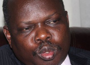 Pagan Amum, South Sudan's Peace minister and chief negotiator, briefs journalists in the capital Juba on July 30, 2011, shortly after returning from Addis Ababa (AFP)