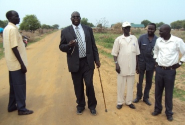 onglei state minister of local government, Diing Akol Diing (C) represented the state government with other officials from Bor county and the constructing company on Friday July 1, 2011 (ST)