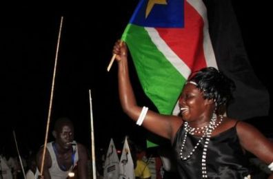 People take part in South Sudan's independence day celebrations along the streets of Juba early July 9, 2011. (Reuters)