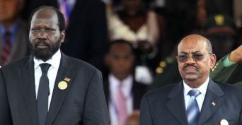 South Sudan's President Salva Kiir (L) and Sudan's President Omar Hassan al-Bashir attend the Independence Day ceremony in South Sudan's capital Juba July 9, 2011 (REUTERS PICTURES)