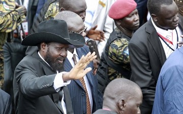 South Sudan's President Salva Kiir waves to his supporters as he arrives at the John Garang mausoleum before the Independence Day celebrations in the capital Juba, July 9, 2011 (Reuters)