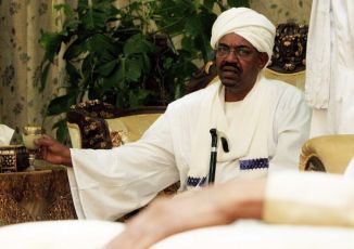 Sudanese President Omar Hassan al-Bashir is seen in Khartoum, upon returning from China, July 1, 2011 (REUTERS PICTURES)