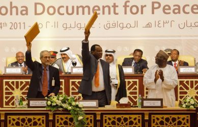 Burika Faso's Compaoré (L) sitting besides Chad's Deby, Emir of Qatar, Sudan's Bashir and the Eritrean President (not seen in the picture) at the signing ceremony of the Doha peace agreement between Sudan and LJM rebels on 14 July 2011 (photo by Olivier Chassot - UNAMID)