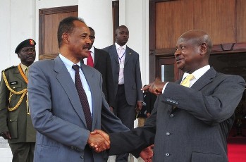 Eritrea's President Isaias Afwerki (L) meets Uganda's President Yoweri Museveni (R) on arrival at the State House in Entebbe, 31km (19 miles) southwest from capital Kampala, August 16, 2011 (Reuters)