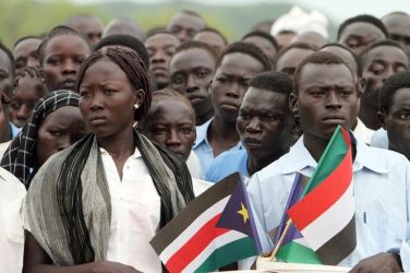 Local residents wait to greet Sudan's Second Vice President Ali Osman Taha as he visits the city of Kadugli in the state of South Kordofan on August 03, 2010. (Getty)