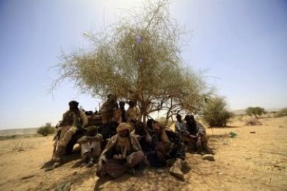 Rebel forces watch during the visit of Joint Special Representative (JSR) Ibrahim Gambari at Fanga Suk village, in East Jebel Marra (West Darfur), March 18, 2011. (Reuters)