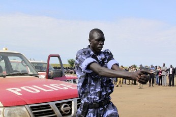 FILE - A police trainee demonstrates crowd control techniques and other skills during a visit of the UN Security Council at a United Nations (UN)-run training camp in the southern Sudanese town of Rejaf October 7, 2010 (Reuters)